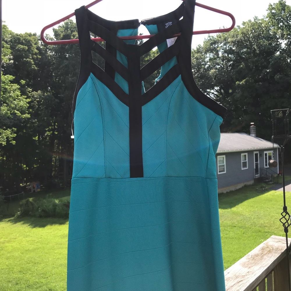 Elegant turquoise fitted dress